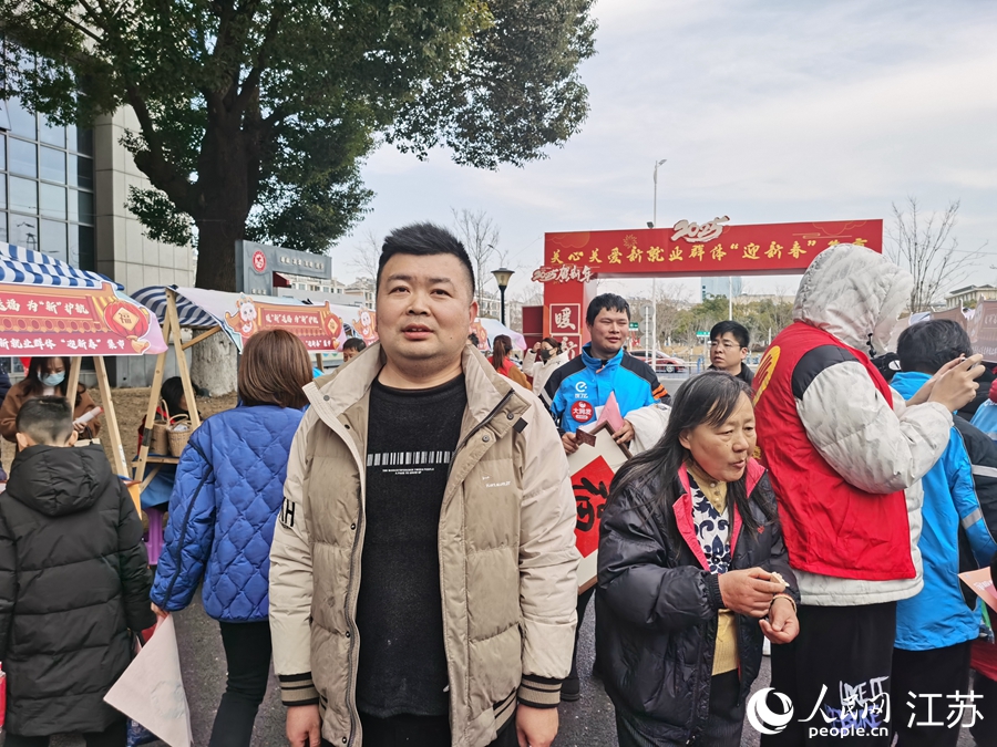 網約車司機張建亮。人民網記者 王繼亮攝