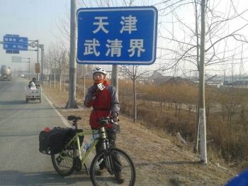 盐城26岁小伙从北京骑车回家 称再不疯狂就老
